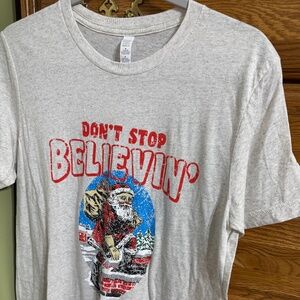 Bella canvas don’t stop believin t shirt size medium